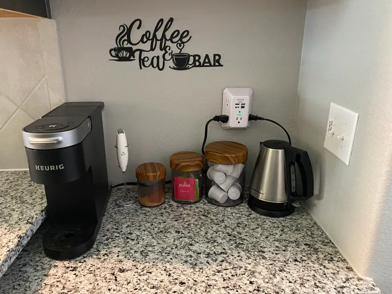Coffee and tea bar with Keurig, kettle and canisters